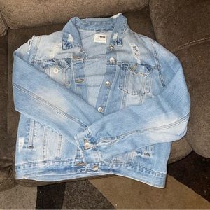 Distressed jean jacket